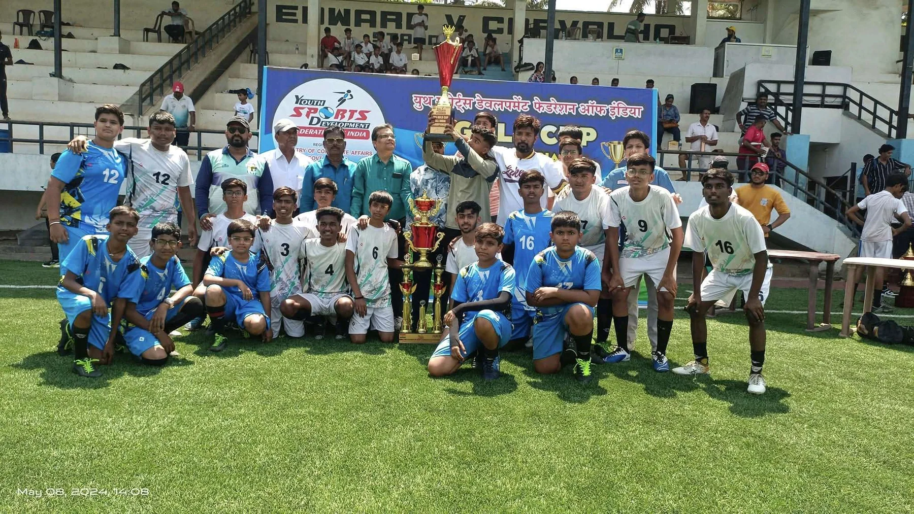 Youth championship team celebrating achievement